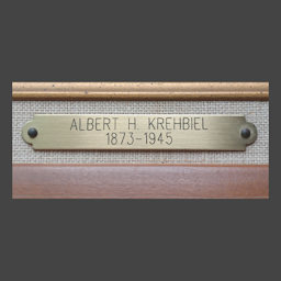 Picture of brass name tag for optional use on picture frame